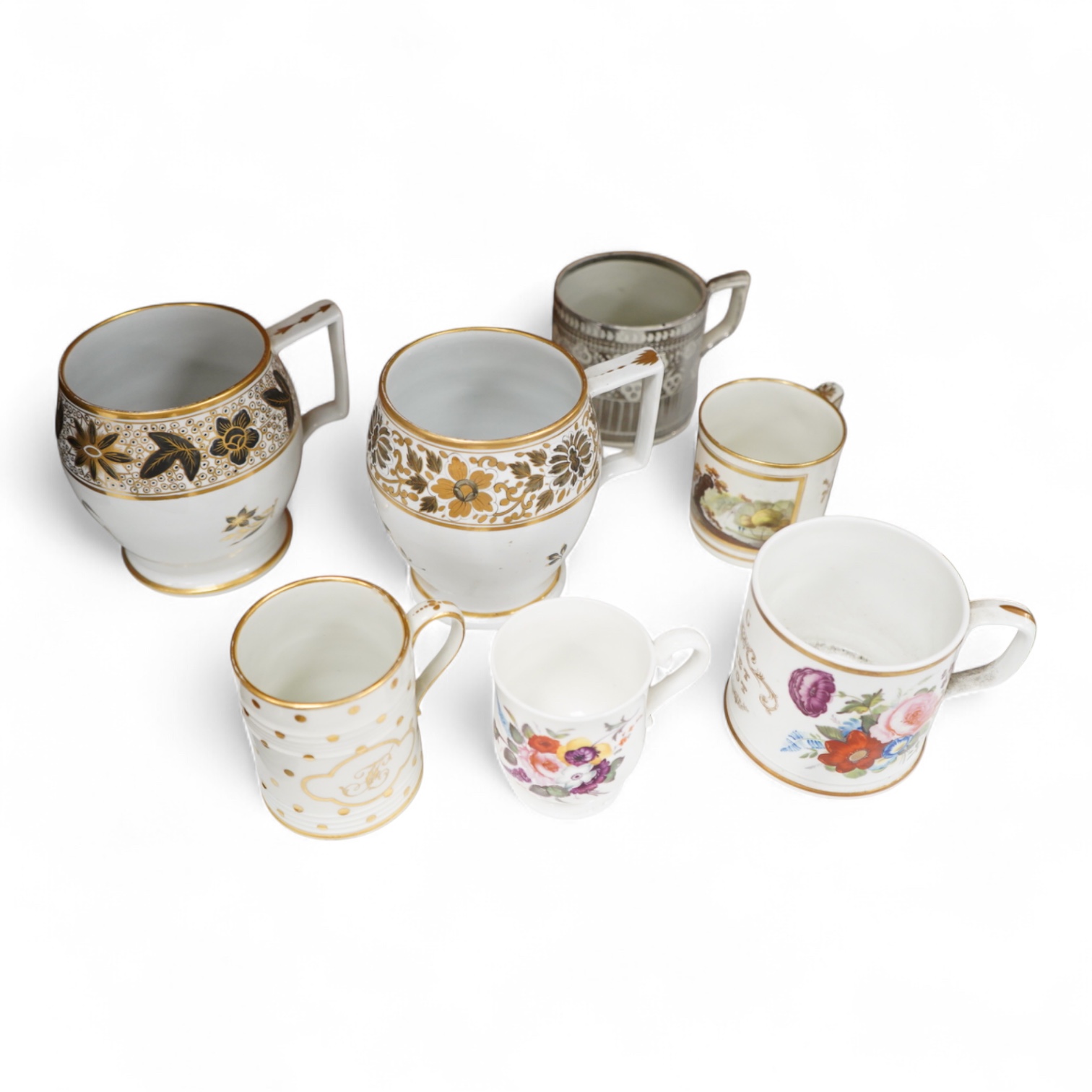 A pair of early 19th century English porcelain large mugs with gilt bands and five other early 19th century porcelain or pearlware mugs, one inscribed SG, Forget Me Not, largest each 14cm high